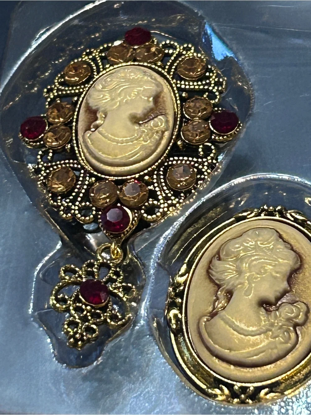 Gold-Tone Cameo Brooch Set with Ruby and Amber Accents